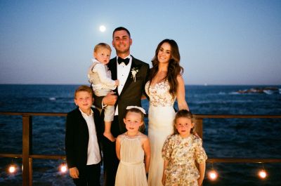 Family portrait of wedding in chileno bay auberge resort in los cabos