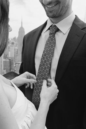 Bride and groom overlooking empire state building during elopement in new york city