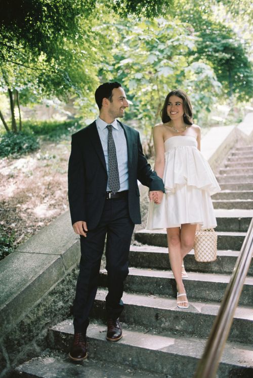 Bride and groom walking in central park in new york city during elopement